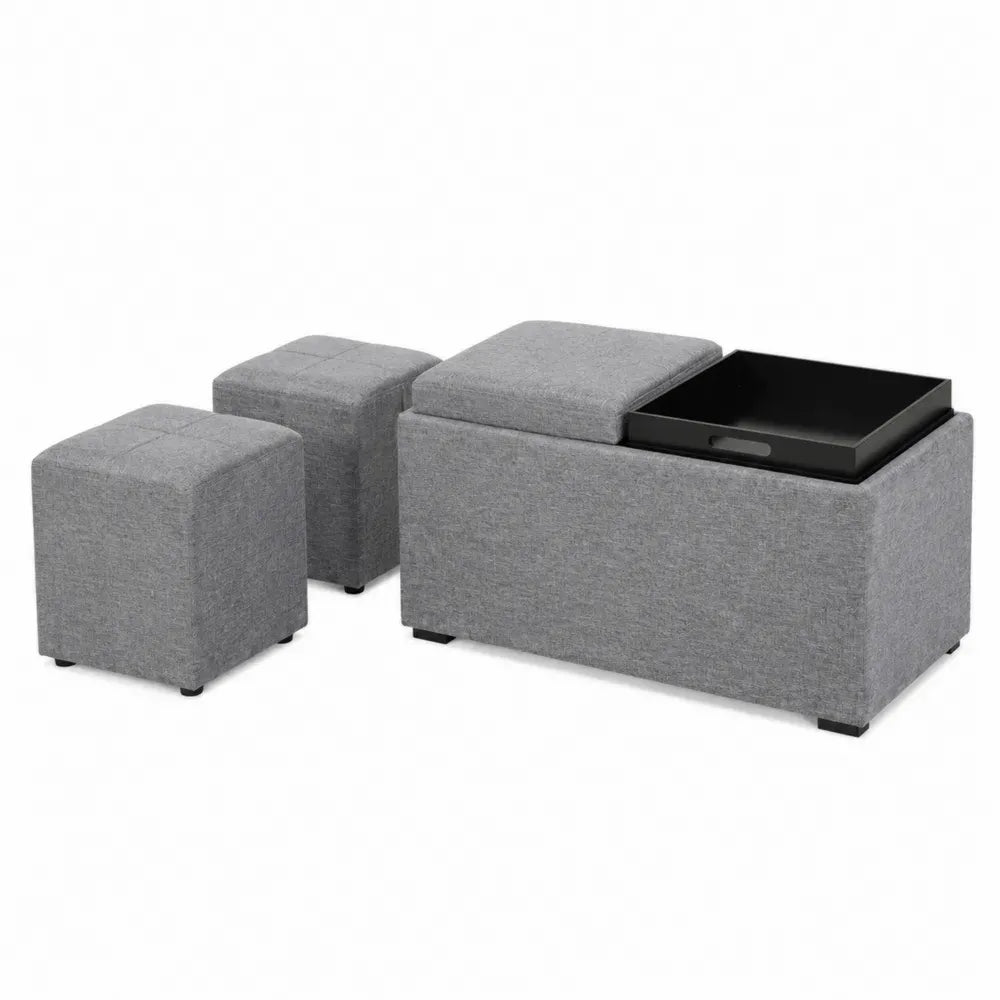 Conjunto de reposapiés de poliéster gris con banco rectangular de almacenaje bandeja negra y 2 pufs auxiliares 100 x 45 x 45 cm